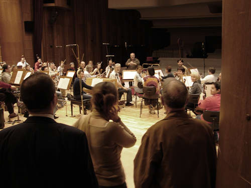 Photo of Harold Schiffman thanking the Győr Philharmonic Orchestra, and receiving their applause, upon completion of their recordings and performance during October 2008. Győr, Hungary (18October2008)