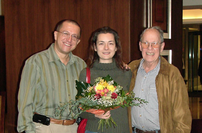 A farewell among friends and colleagues as Harold Schiffman and Jane Perry-Camp are to depart from Hungary.  A bouquet of flowers from Dávid Zsolt Király was presented to Szidónia Juhász in gratitude for her indispensible role, always graciously performed, in all the months' activities. Győr, Hungary (29 October 2008)