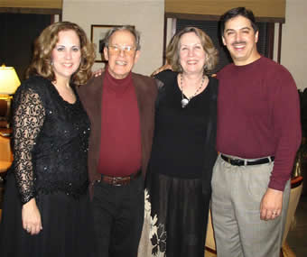 Photo of mezzo-soprano soloist Nadine Cheek Whitney, composer Harold Schiffman, poet Kathryn Stripling Byer, conductor Alexander Jiménez at the reception following the première of Alma. The Florida State University, Tallahassee (15 April 2005) Photograph by Gary Whitney
