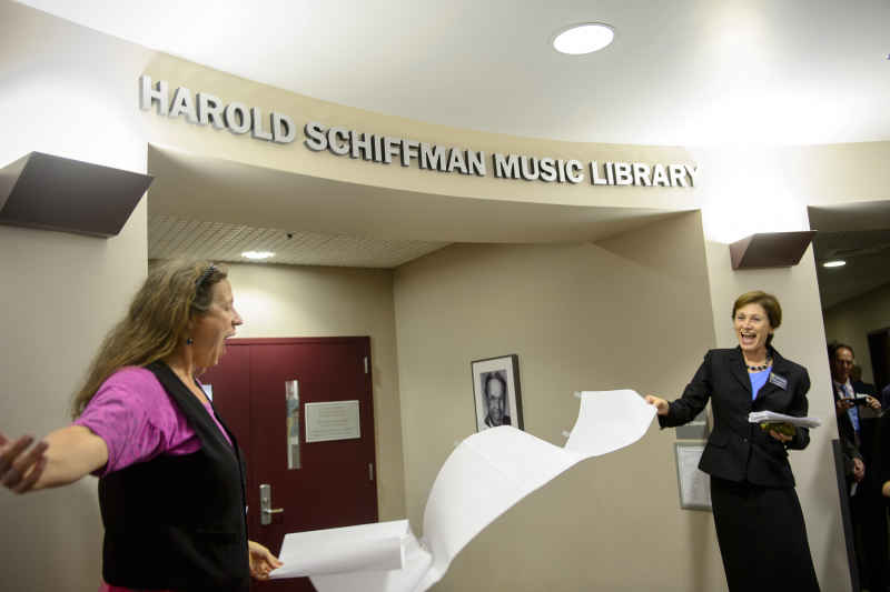 Photo of Music Librarian Sarah Brooks Dorsey and Dean of University Libraries Rosann Bazirjian unveiling the Harold Schiffman Music Library (05 October 2012)